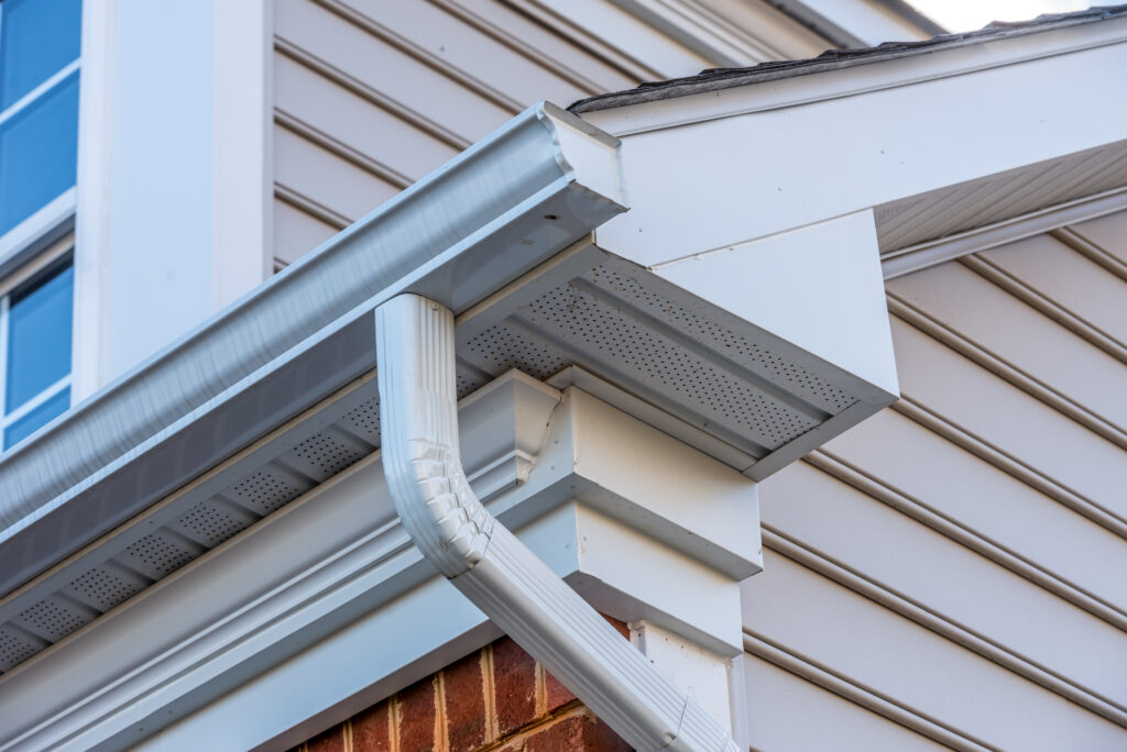 Close-up of half-round gutters installation